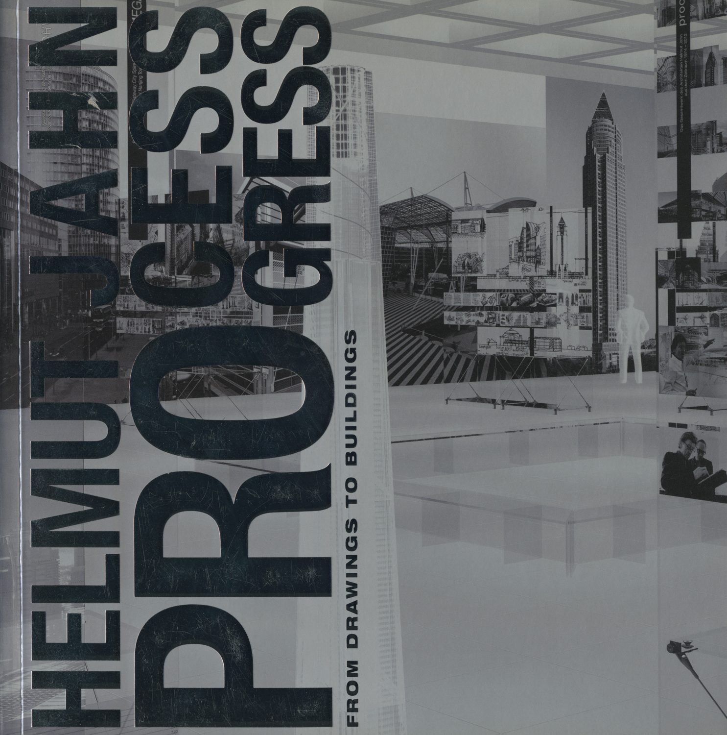 In etwa zweigeteilt: rechts Teil der Ausstellung mit Fotografien der Architekturen, links: vertikal von unten nach oben, Beschriftung: Helmut Jahn Pro-cess -gress From Drawings to Buildings.