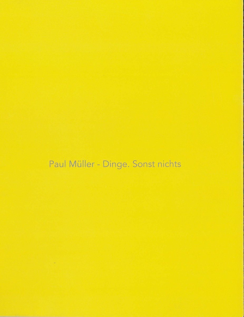 Yellow book. Inscription slightly off centre: Paul Müller - Dinge. Sonst nichts.