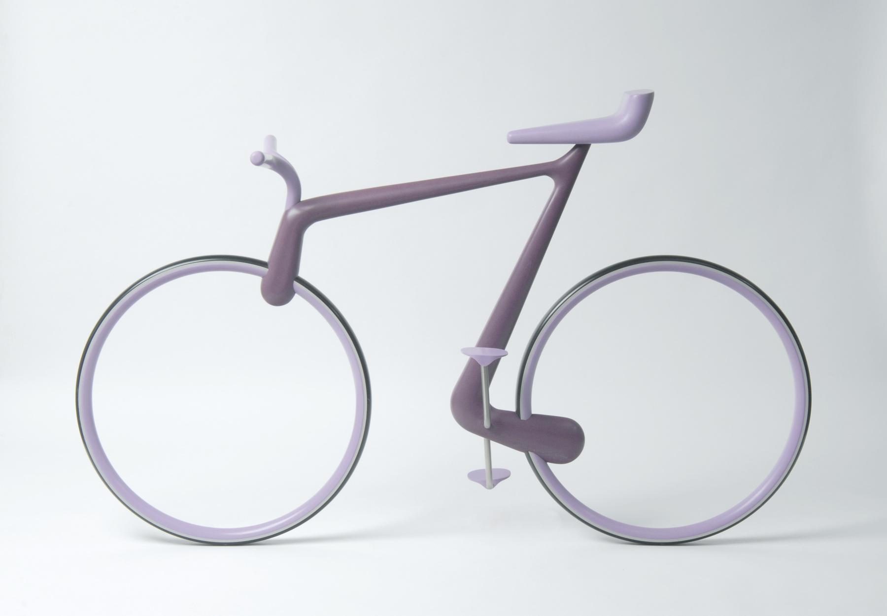 Futuristic bike in a soft purple colour scheme with a curved frame and spokeless wheels.