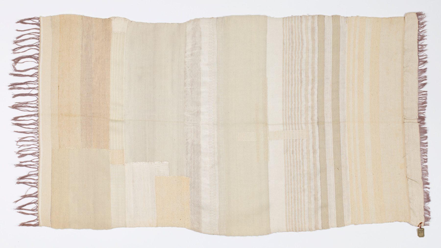 Photo tapestry. Stripes in various shades of white. Fringes at the narrower ends.