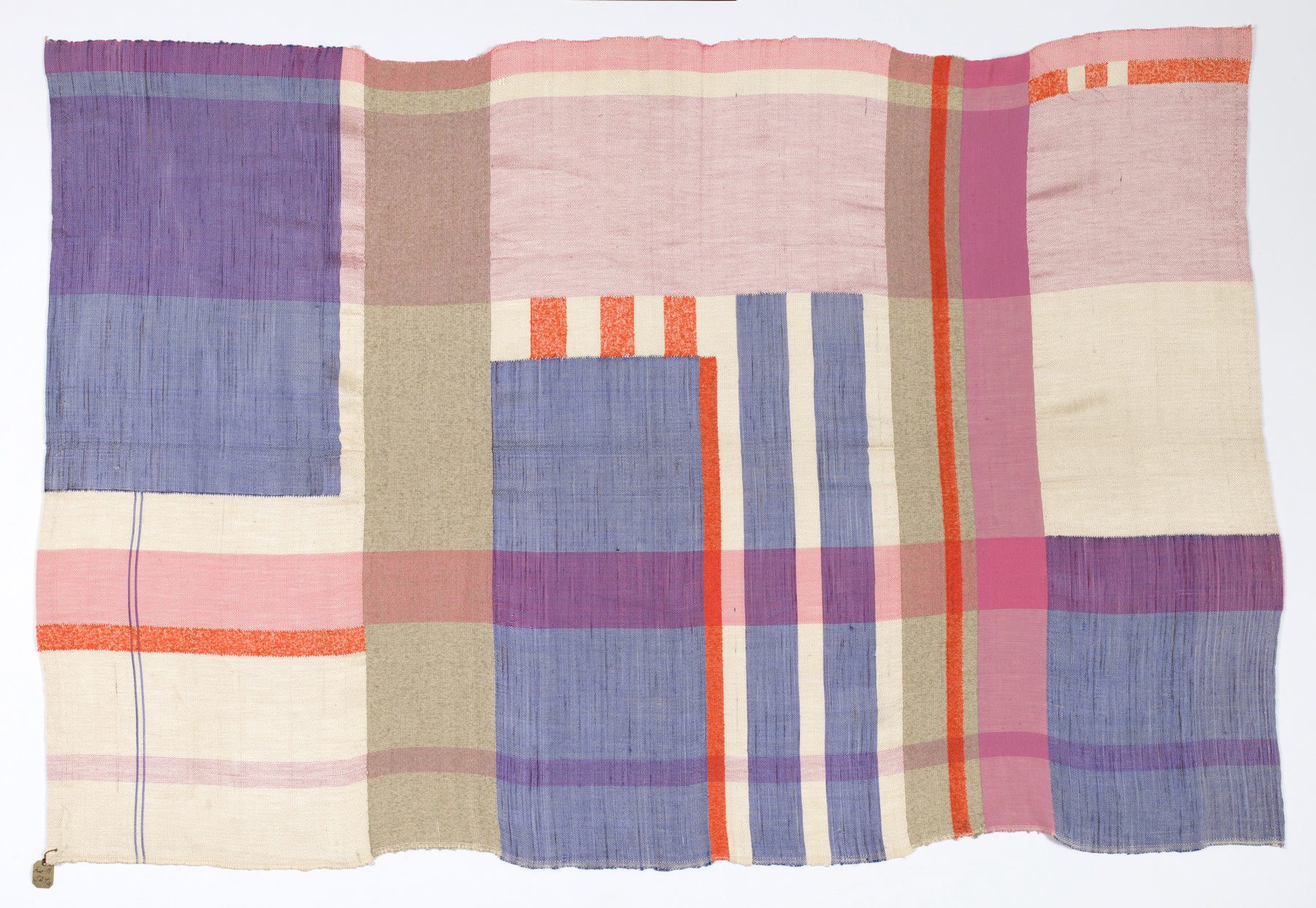 Photo tapestry. Check pattern of blue, white, pink, orange and gray stripes of different widths. The Pattern skips at places and therefor forms different shapes.