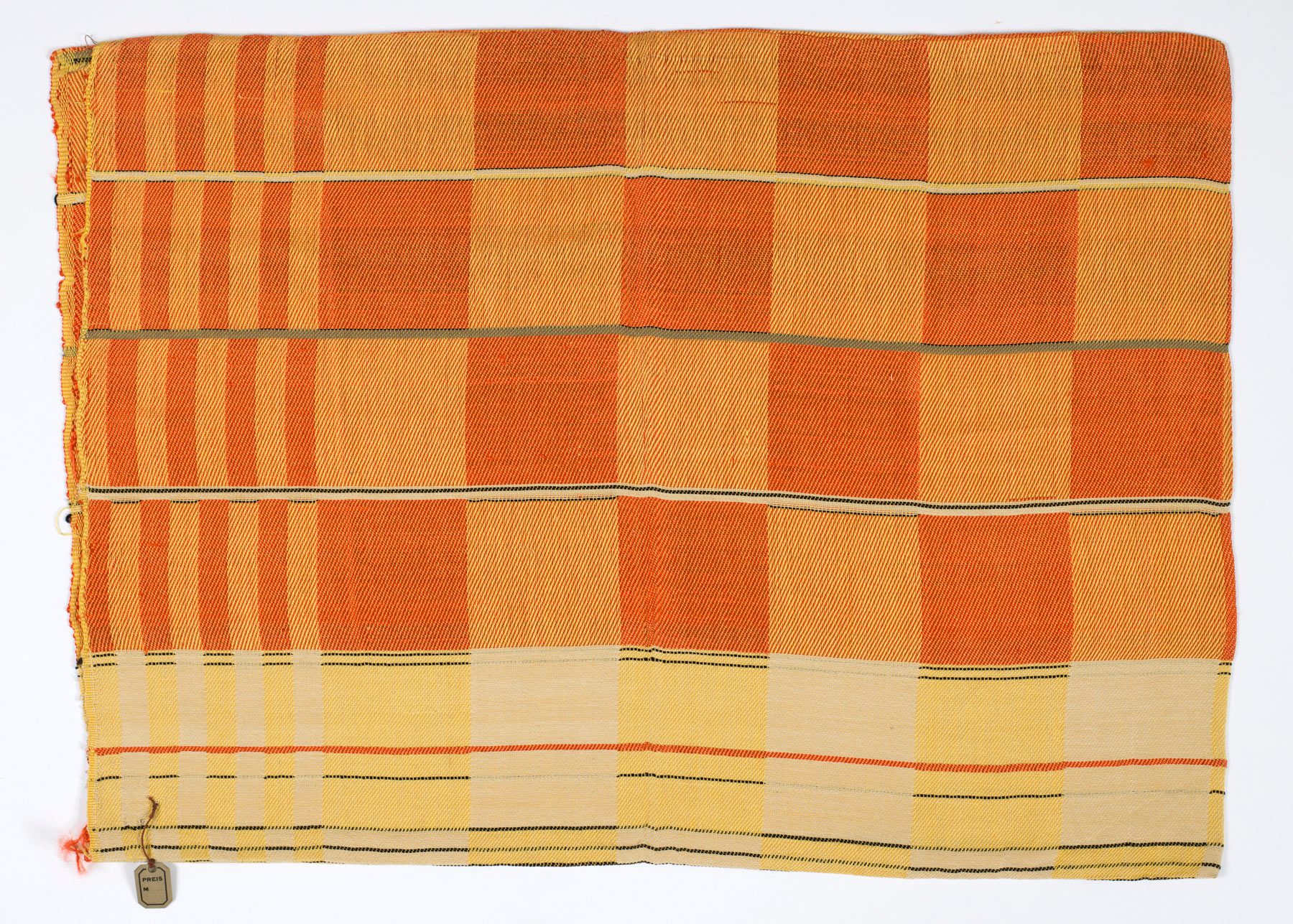 Photo cushion cover made of checks in various shades of orange. The checks change to yellow at the bottom.