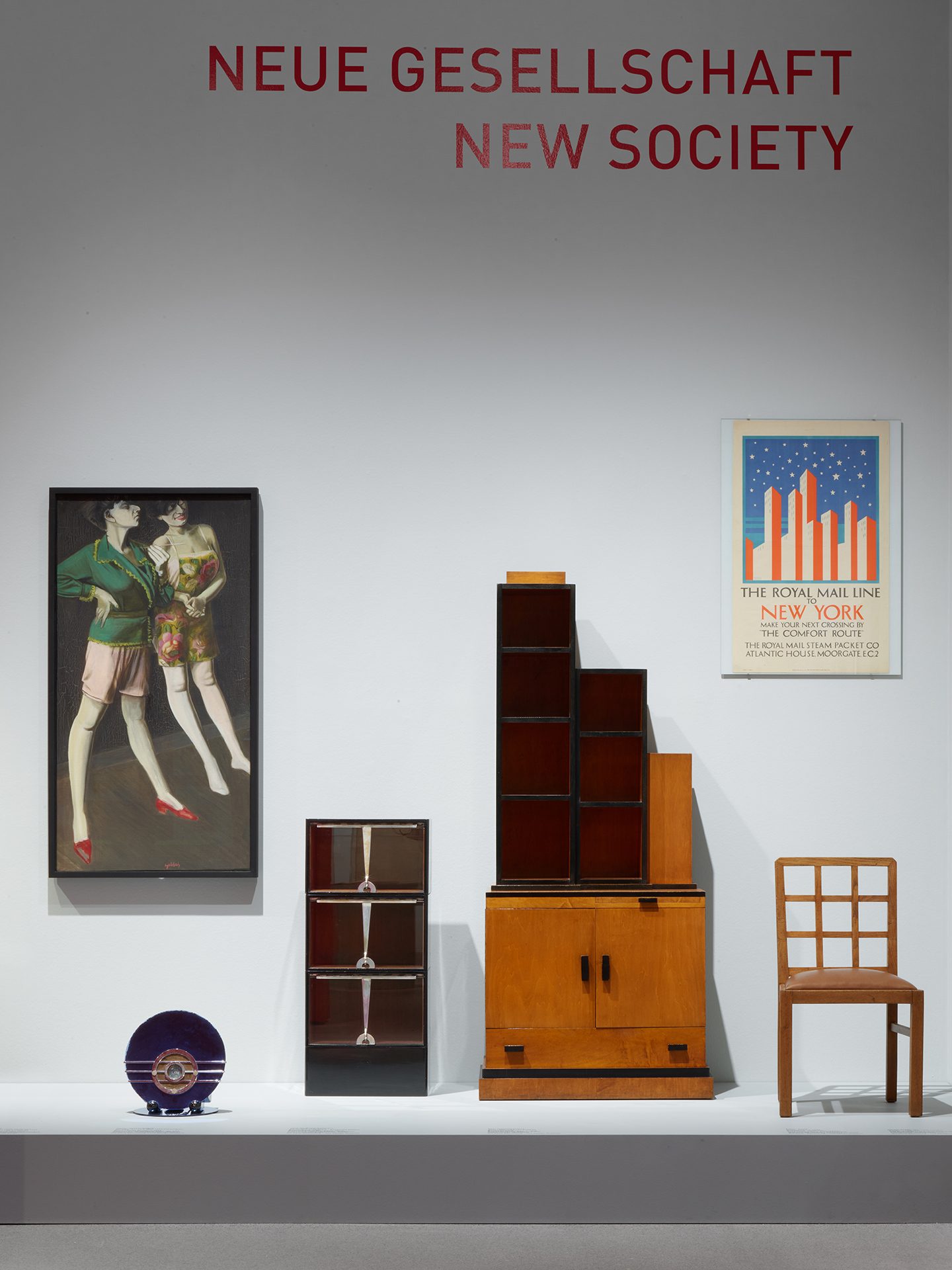 You can see the exhibition installation "4 Museums – 1 Modernism." You can see furniture, objects, and graphics.