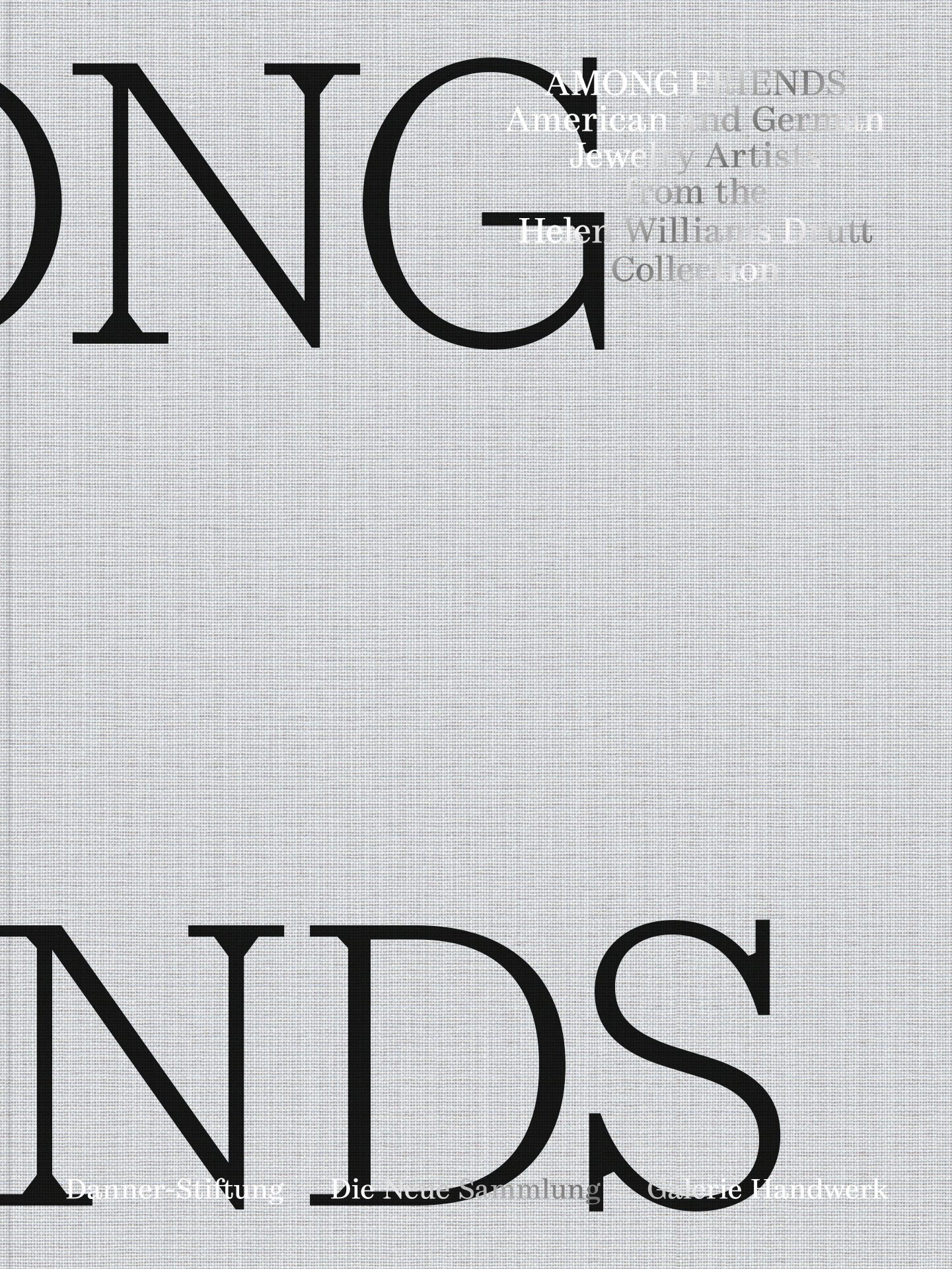 Grey book cover with black lettering, linen binding and silver-coloured deep embossing.